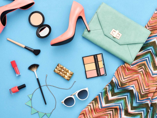 Fashion stylish clothes, cosmetics, makeup accessories. Urban summer girl colorful outfit. Stylish glamor heels, handbag clutch, trendy pants, necklace sunglasses. Woman essentials. Unusual, top view